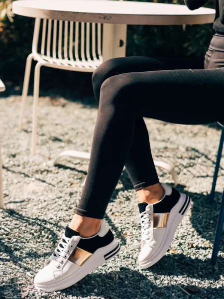 Nedelya fehér és fekete női sportcipő, műbőrből készült