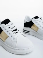 Nedelya fehér és fekete női sportcipő, műbőrből készült