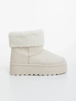 Deraza világos bézs női csizma textil anyagból