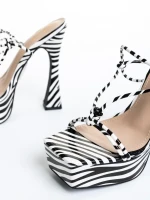 Kimbra fehér és fekete női szandál, műbőrből készült