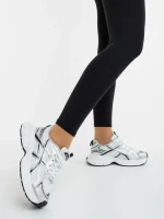 Elle fehér és ezüstszinű női sportcipő ökológiai bőrből és textil anyagból