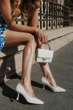 Estiana bézs női magassarkú cipő textil anyagból