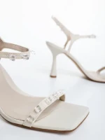 Anzira bézs női magassarkú szandál textil anyagból